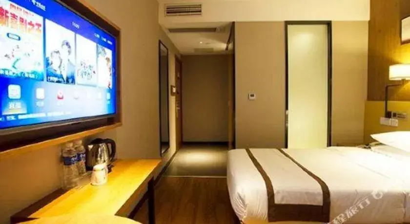 Bed in Jtour Inn Huanggang Wuxue City Square Bed in Jtour Inn Huanggang Wuxue City Square