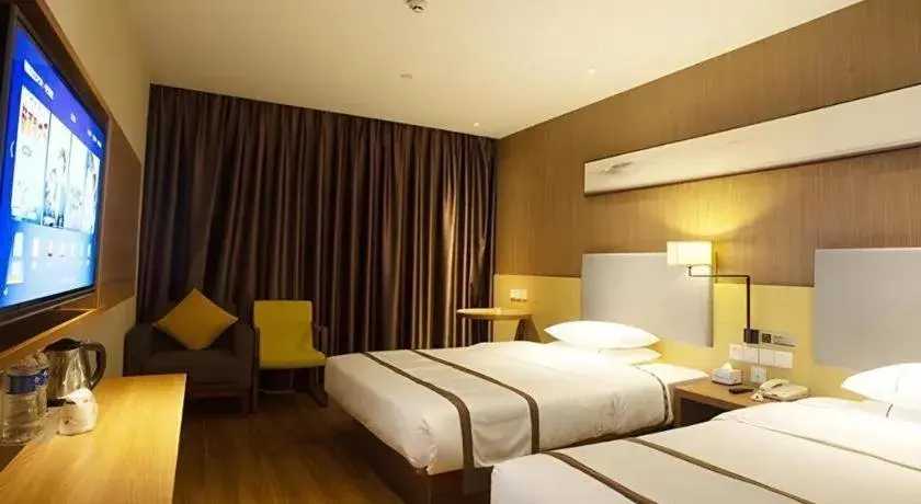 Bed in Jtour Inn Huanggang Wuxue City Square Bed in Jtour Inn Huanggang Wuxue City Square