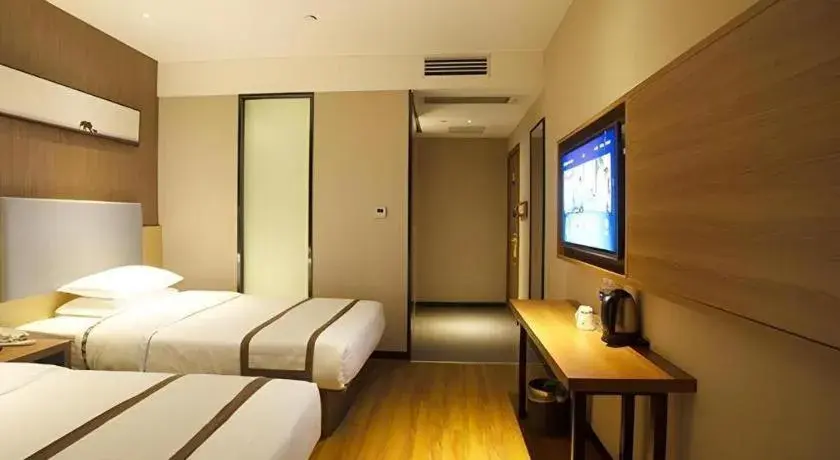 Bed in Jtour Inn Huanggang Wuxue City Square Bed in Jtour Inn Huanggang Wuxue City Square