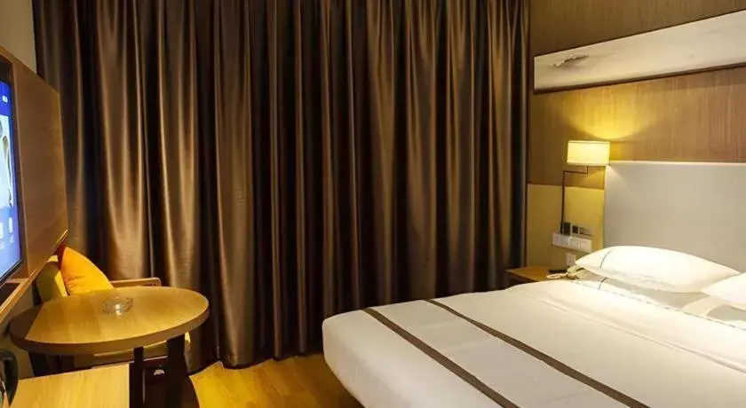 Bed in Jtour Inn Huanggang Wuxue City Square Bed in Jtour Inn Huanggang Wuxue City Square