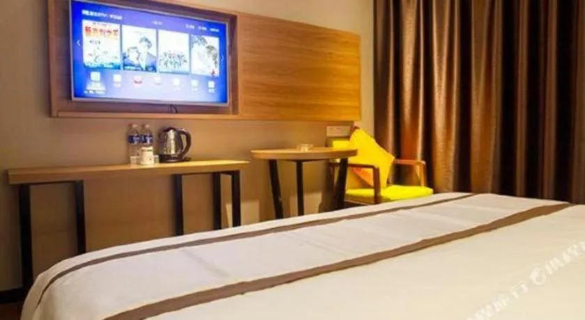 Bed in Jtour Inn Huanggang Wuxue City Square