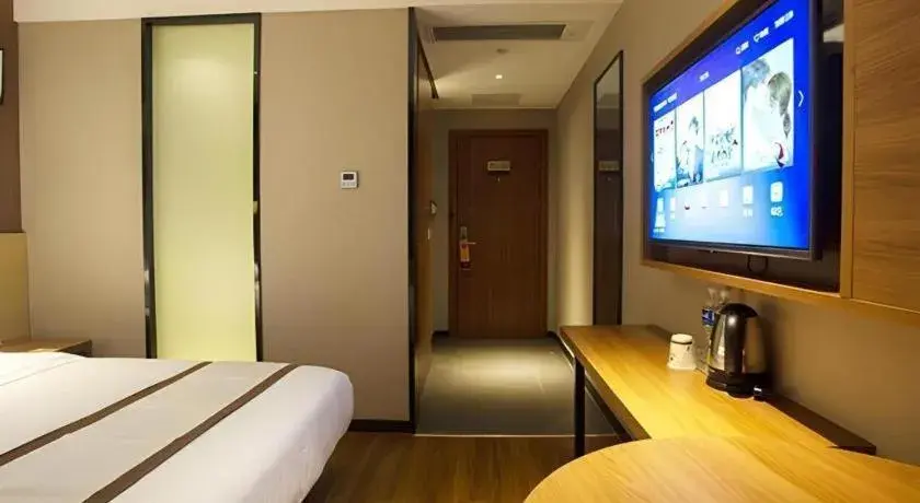 Bed in Jtour Inn Huanggang Wuxue City Square Bed in Jtour Inn Huanggang Wuxue City Square