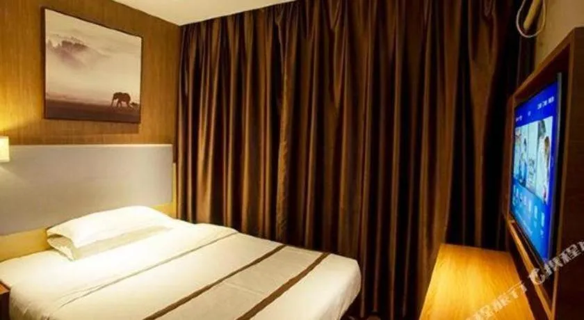 Bed in Jtour Inn Huanggang Wuxue City Square