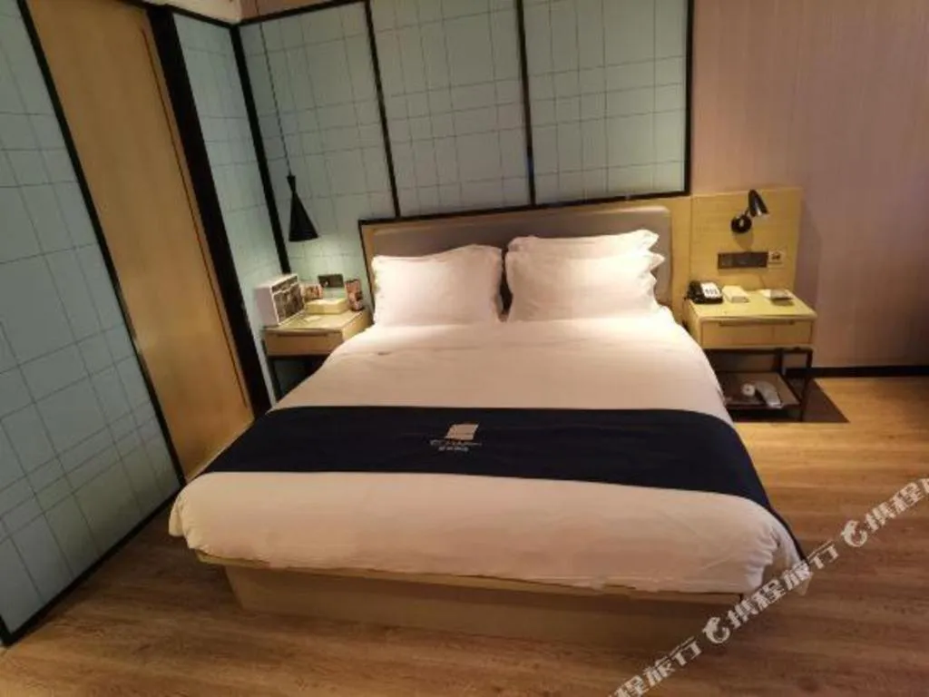 Bed in Echarm Hotel An'xi Hengxing Coach Station