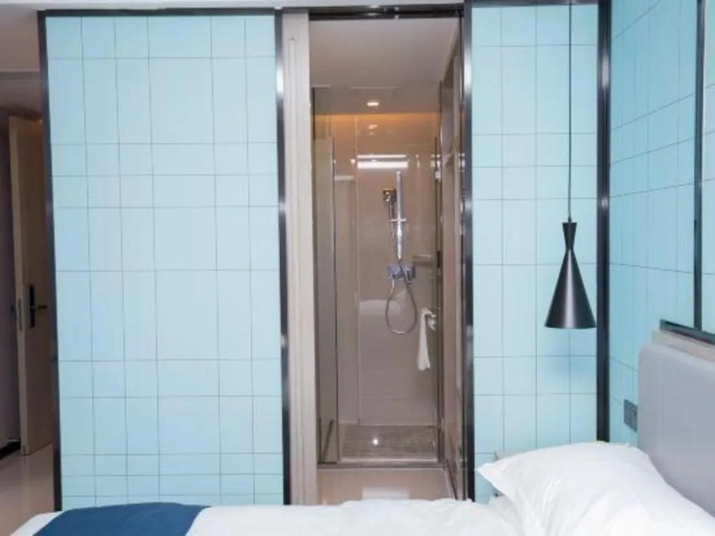 Bed in Echarm Hotel An'xi Hengxing Coach Station