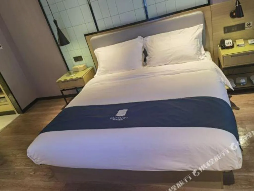 Bed in Echarm Hotel An'xi Hengxing Coach Station