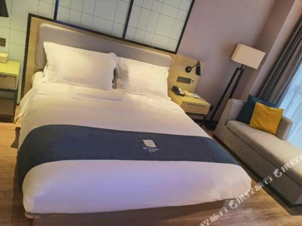 Bed in Echarm Hotel An'xi Hengxing Coach Station