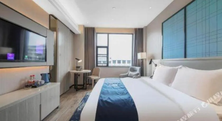 Bed in Echarm Hotel An'xi Hengxing Coach Station