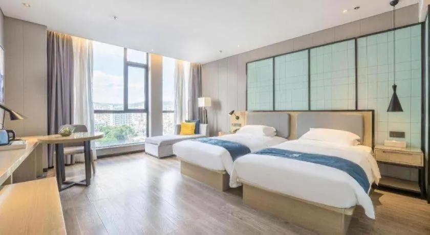 Bed in Echarm Hotel An'xi Hengxing Coach Station