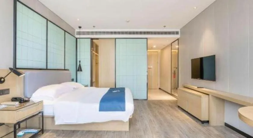 Bed in Echarm Hotel An'xi Hengxing Coach Station