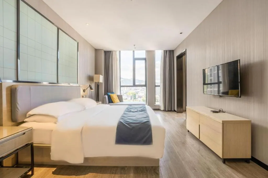 Bed in Echarm Hotel An'xi Hengxing Coach Station