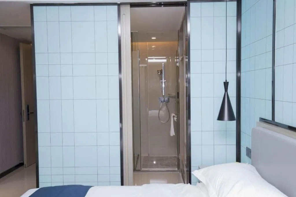 Bed in Echarm Hotel An'xi Hengxing Coach Station