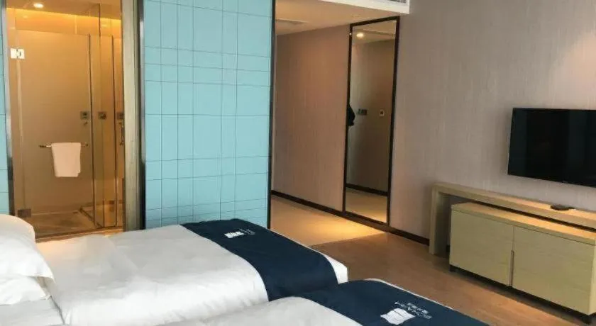 Bed in Echarm Hotel An'xi Hengxing Coach Station