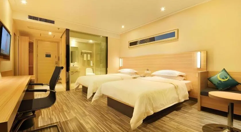 Bed in City Comfort Inn Wuhan Panlongcheng Baishang Shopping Center