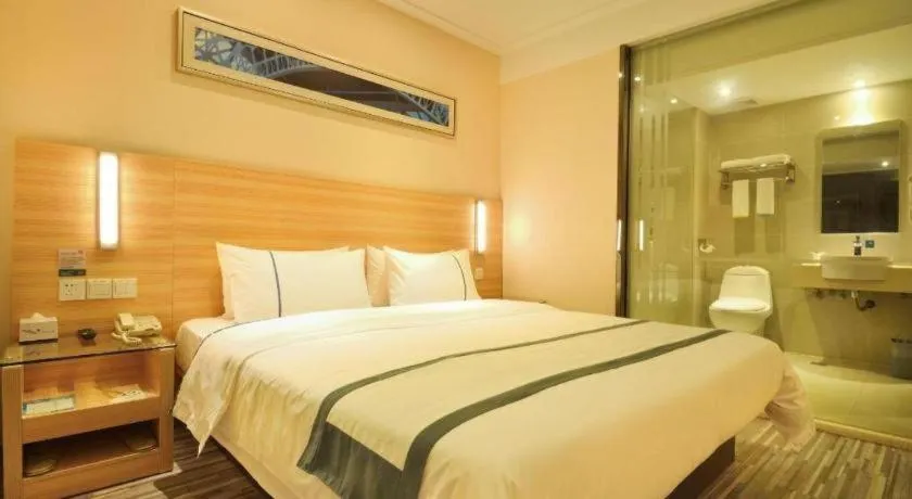 Bed in City Comfort Inn Wuhan Panlongcheng Baishang Shopping Center