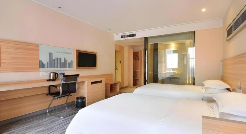 Bed in City Comfort Inn Wuhan Panlongcheng Baishang Shopping Center