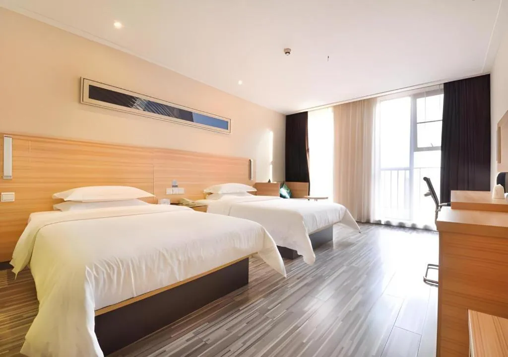 Bed in City Comfort Inn Wuhan Panlongcheng Baishang Shopping Center