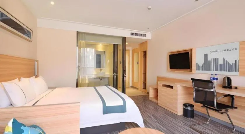 Bed in City Comfort Inn Wuhan Panlongcheng Baishang Shopping Center