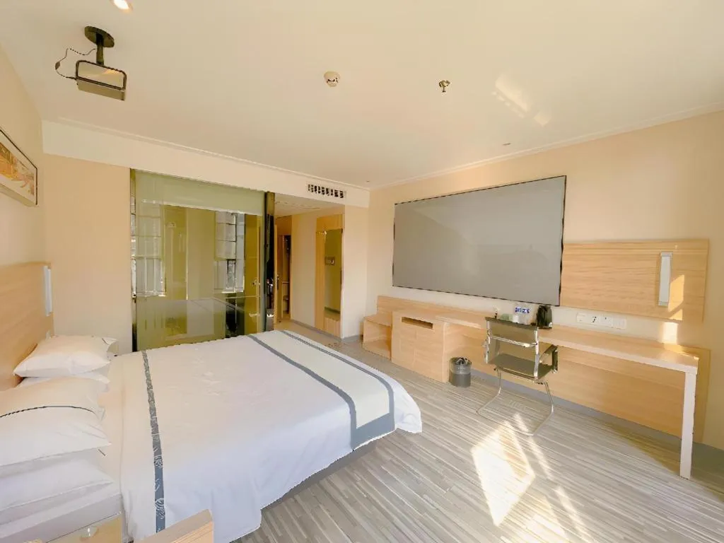 Bed in City Comfort Inn Wuhan Panlongcheng Baishang Shopping Center