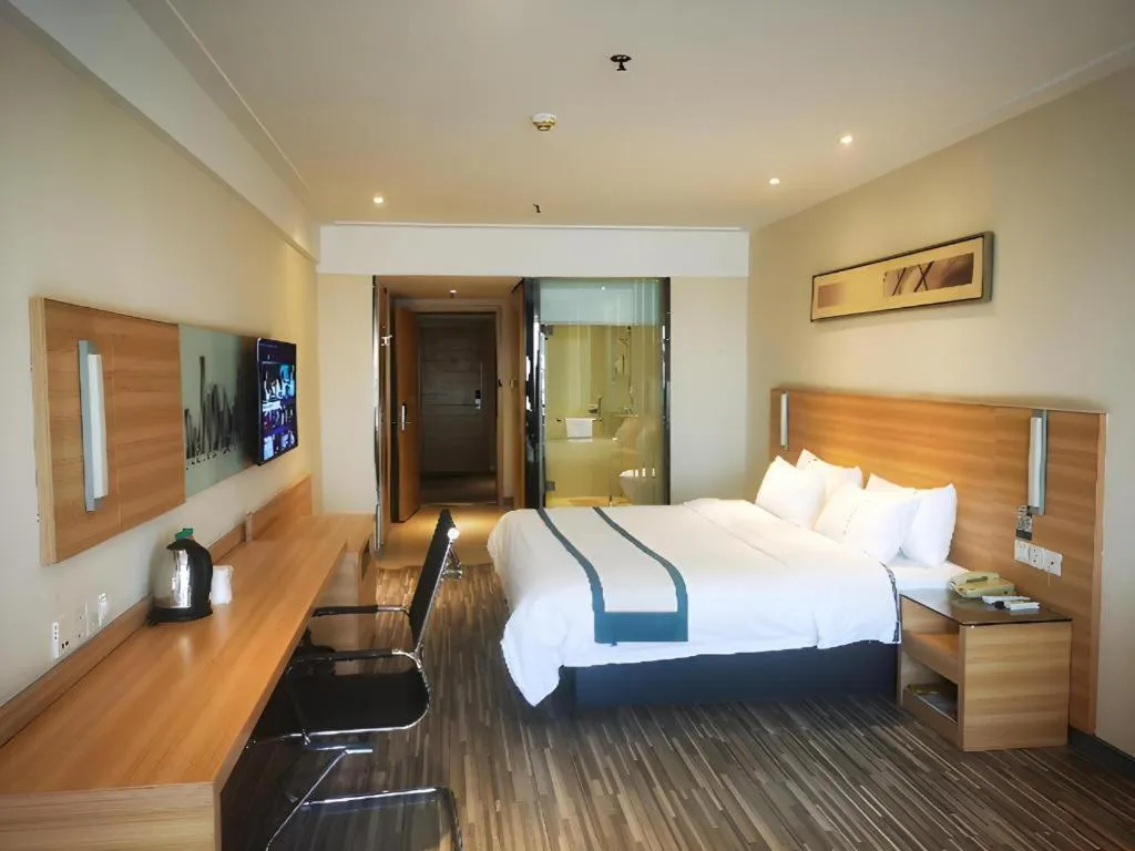 Bed in City Comfort Inn Wuhan Sports Center Sanjiaohu Metro Station