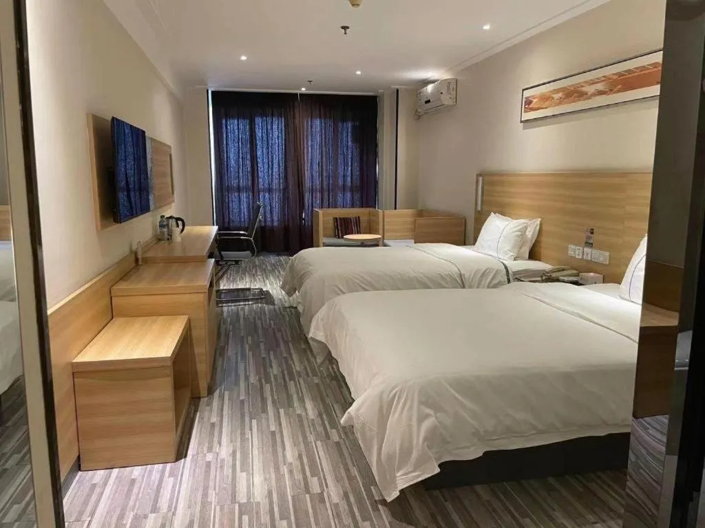 Bed in City Comfort Inn Wuhan Sports Center Sanjiaohu Metro Station