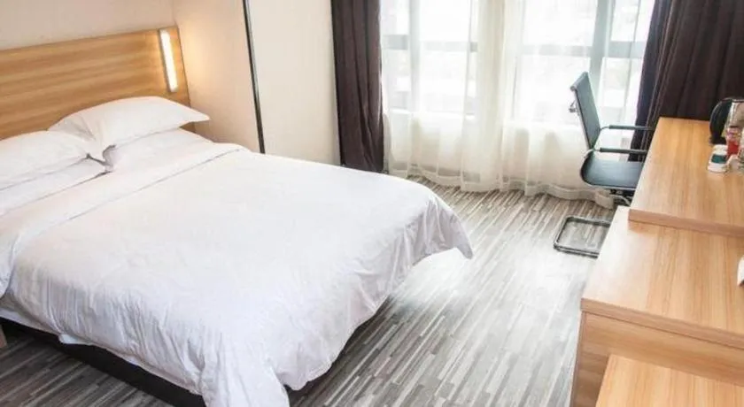 Bed in City Comfort Inn Wuhan Sports Center Sanjiaohu Metro Station