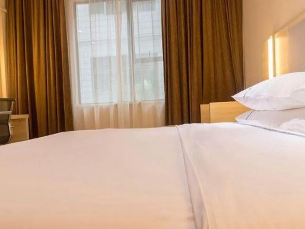 Bed in City Comfort Inn Guangzhou Zengcheng Yonghe Yongkang Road