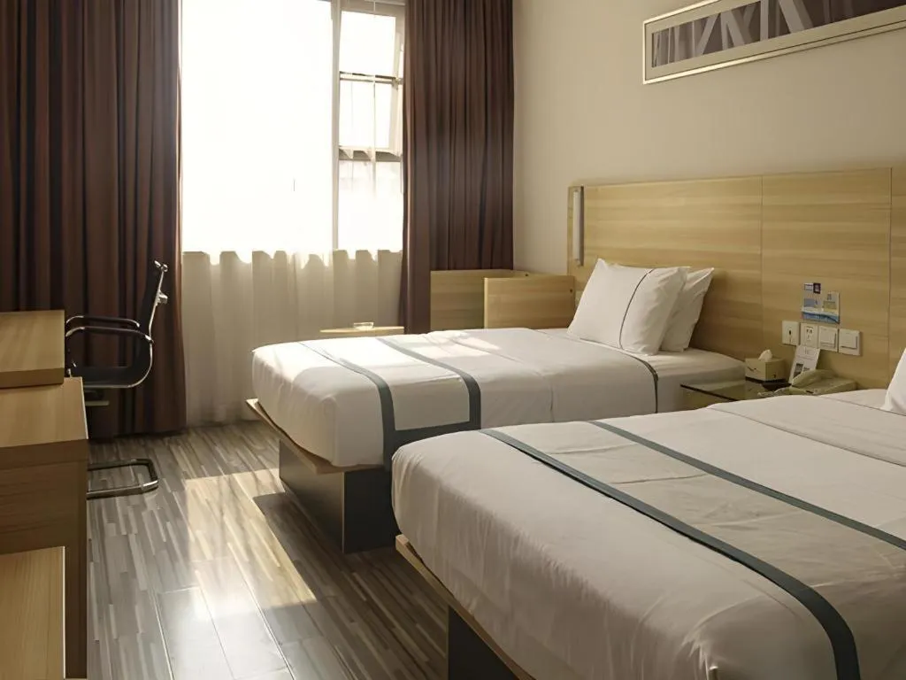 Bed in City Comfort Inn Guangzhou Zengcheng Yonghe Yongkang Road