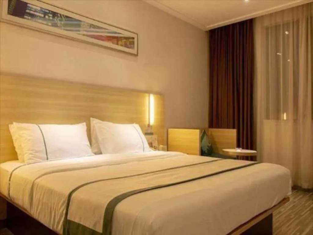 Bed in City Comfort Inn Guangzhou Zengcheng Yonghe Yongkang Road