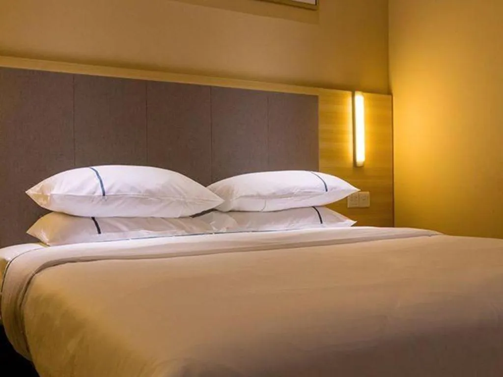 Bed in City Comfort Inn Guangzhou Zengcheng Yonghe Yongkang Road