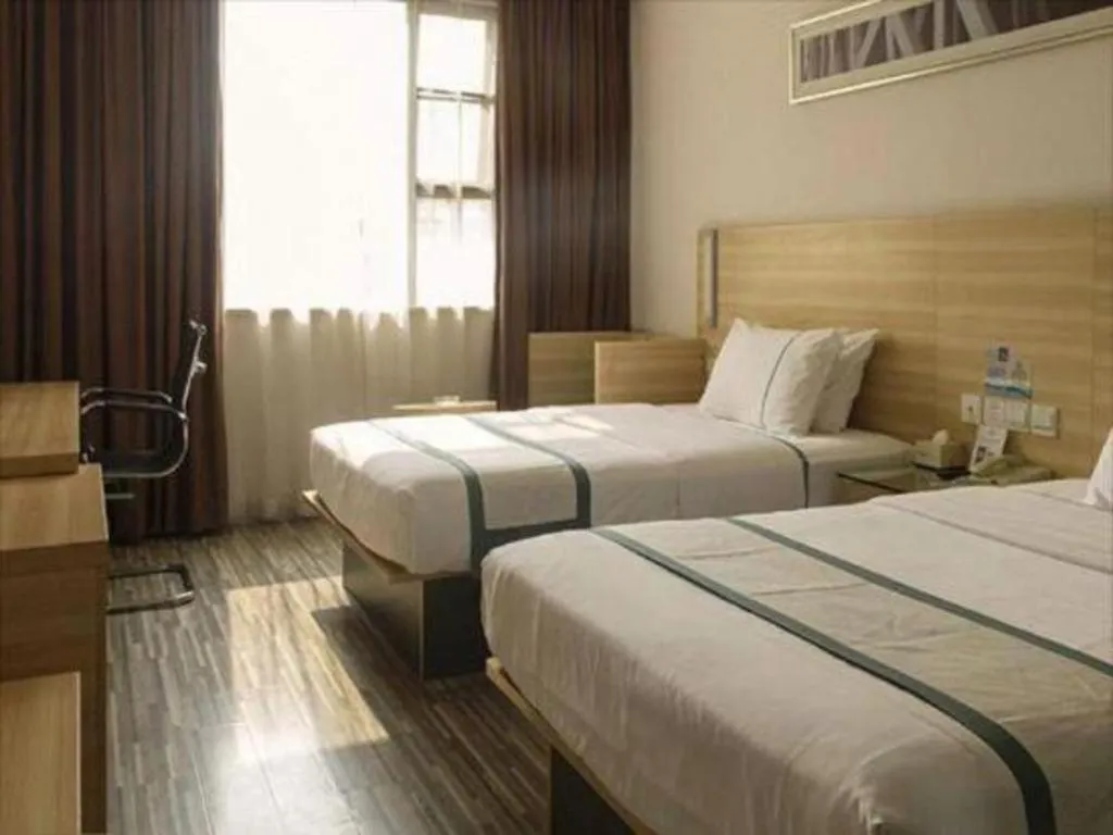 Bed in City Comfort Inn Guangzhou Zengcheng Yonghe Yongkang Road