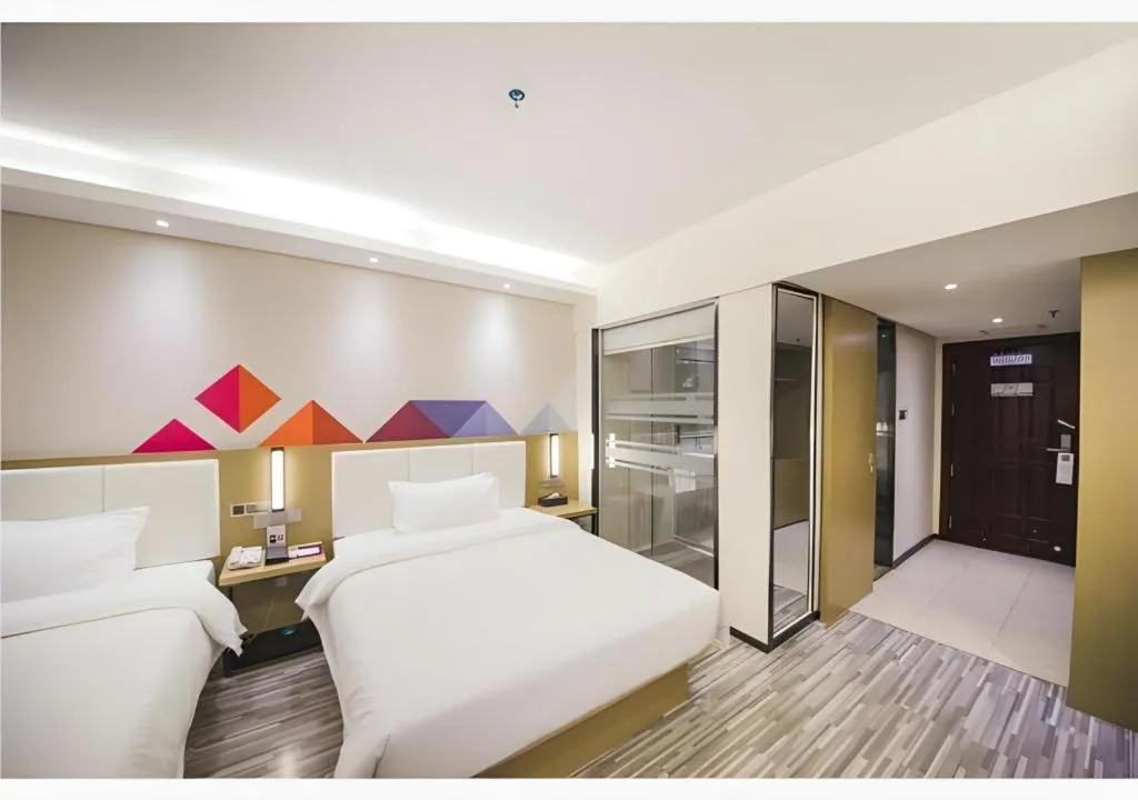 Bed in Borrman Hotel Guilin High-speed Railway North Station Evergrande Plaza