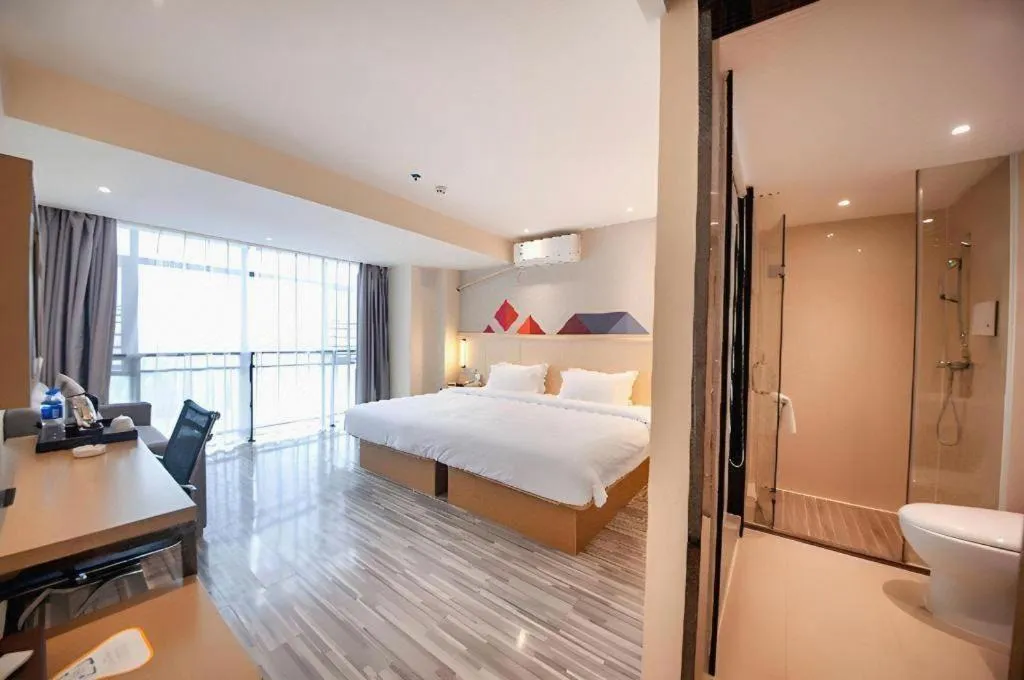 Bed in Borrman Hotel Guilin High-speed Railway North Station Evergrande Plaza