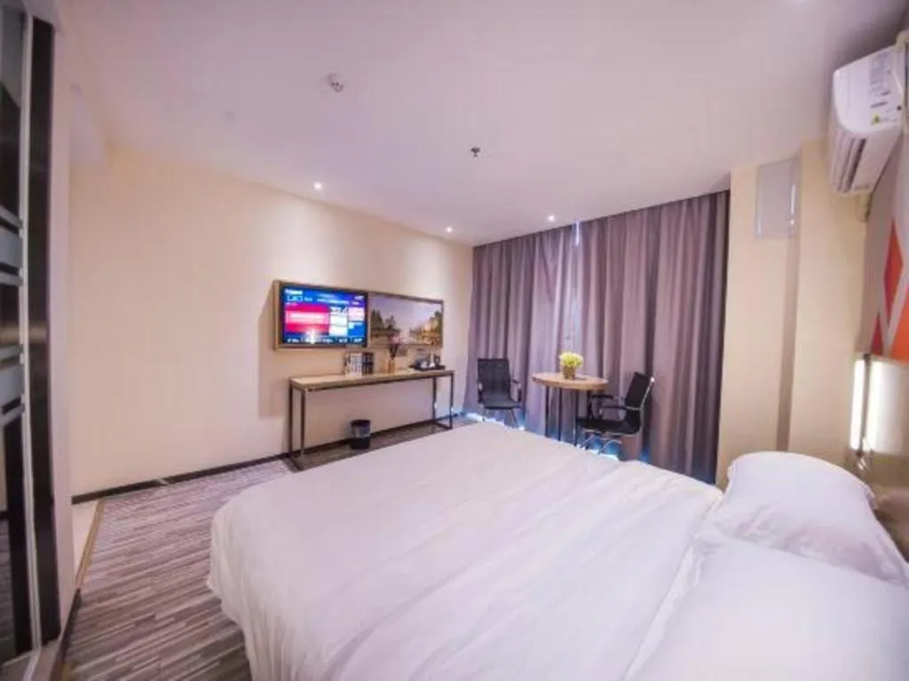 Bed in Borrman Hotel Guilin High-speed Railway North Station Evergrande Plaza