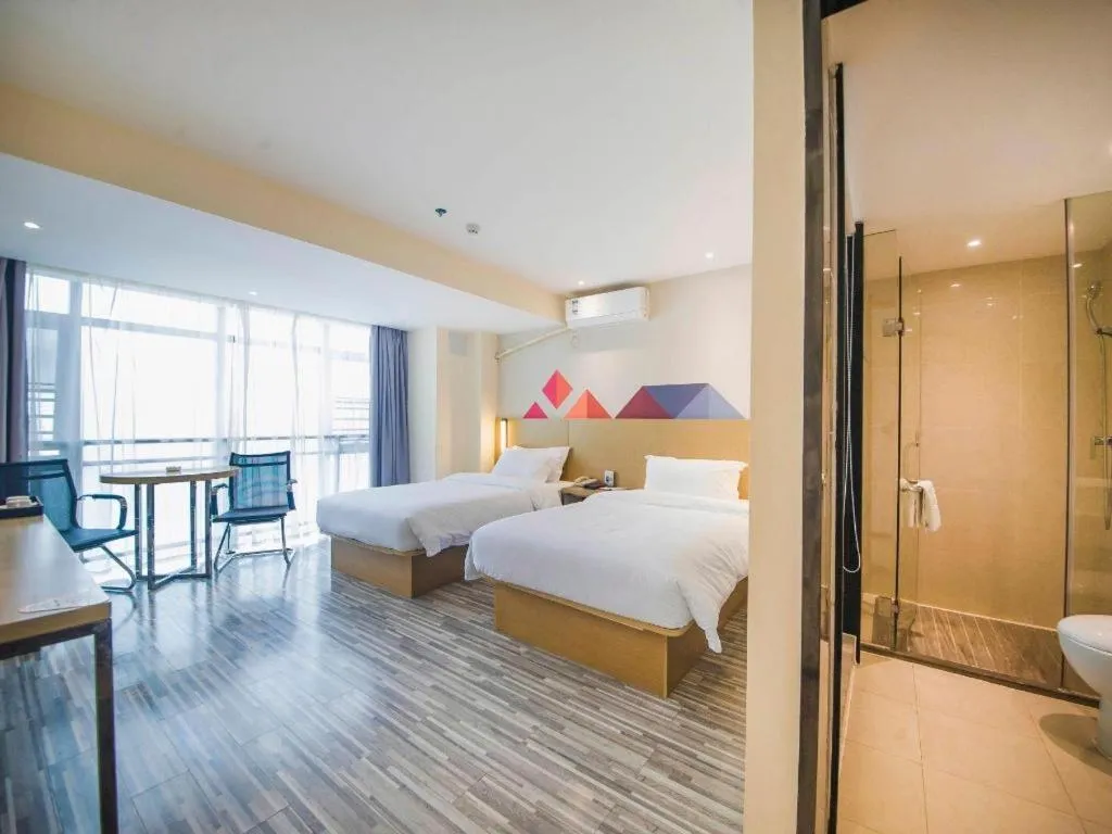 Bed in Borrman Hotel Guilin High-speed Railway North Station Evergrande Plaza