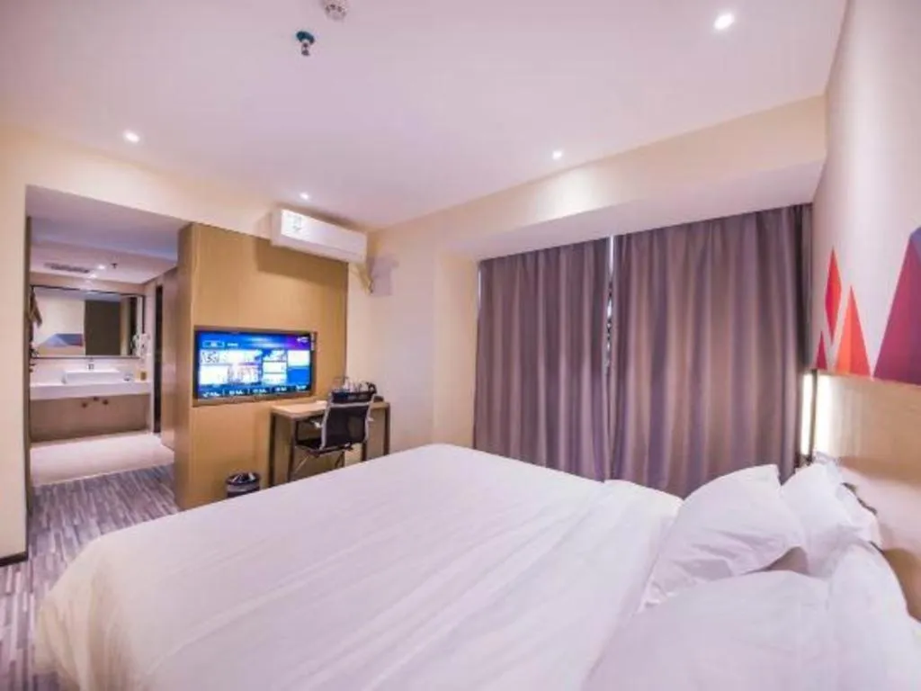 Bed in Borrman Hotel Guilin High-speed Railway North Station Evergrande Plaza