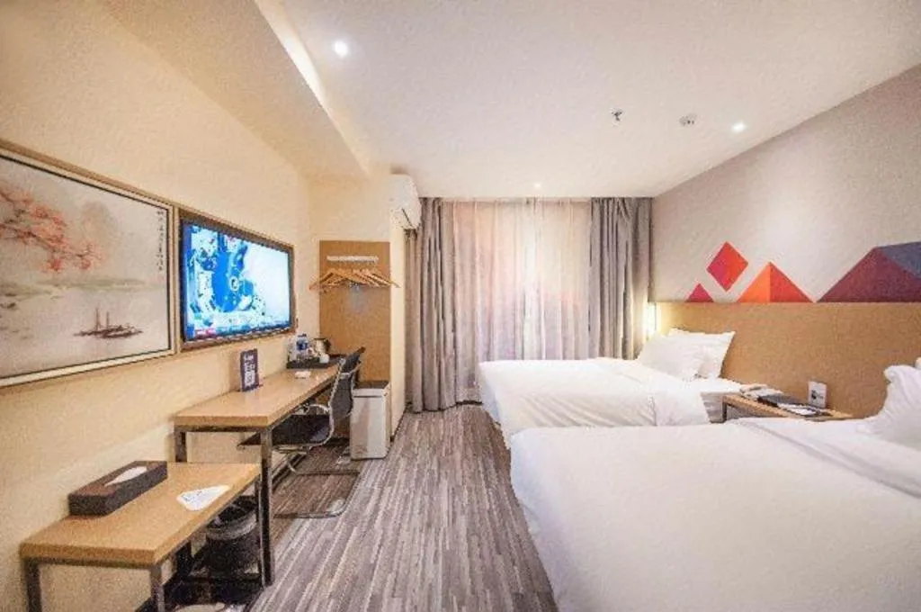 Bed in Borrman Hotel Guilin High-speed Railway North Station Evergrande Plaza