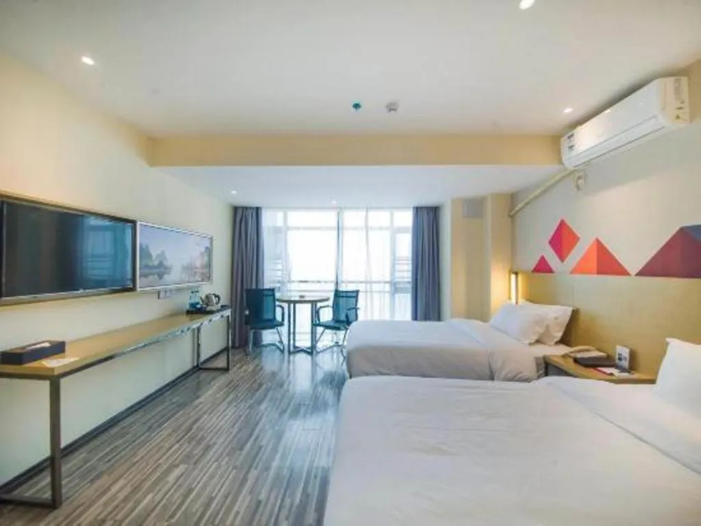 Bed in Borrman Hotel Guilin High-speed Railway North Station Evergrande Plaza