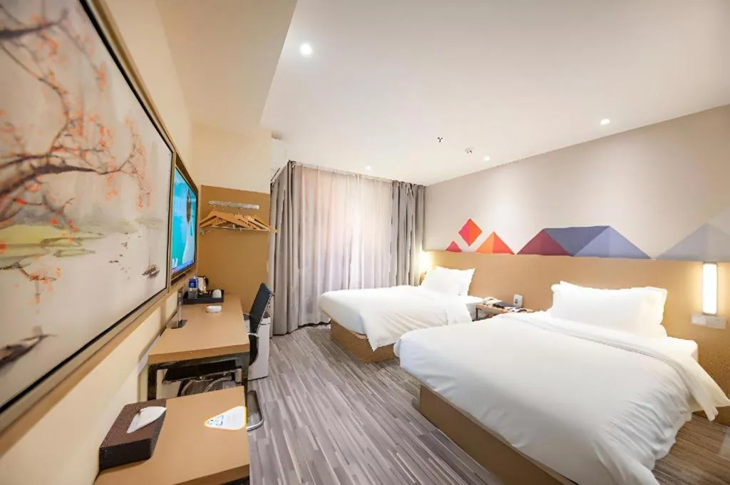 Bed in Borrman Hotel Guilin High-speed Railway North Station Evergrande Plaza