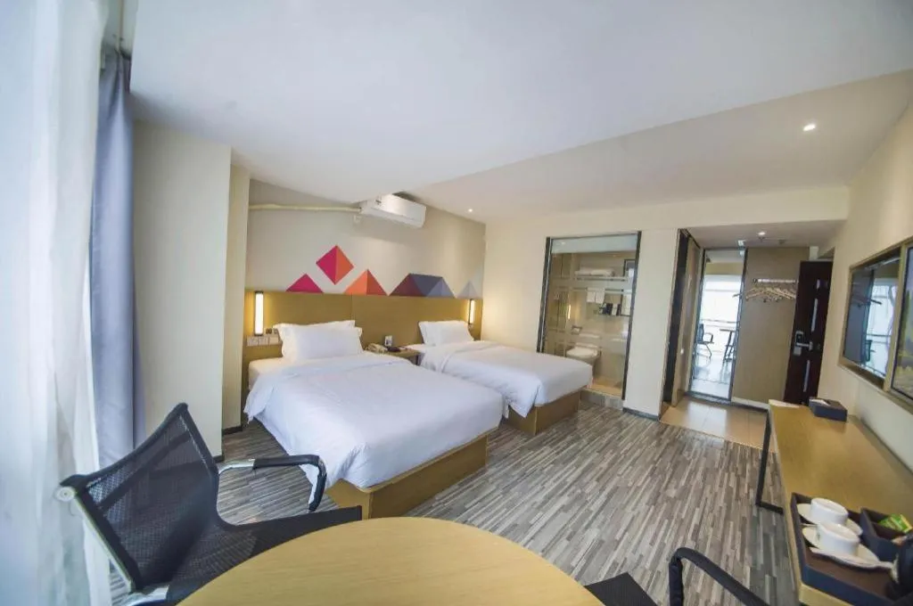 Bed in Borrman Hotel Guilin High-speed Railway North Station Evergrande Plaza