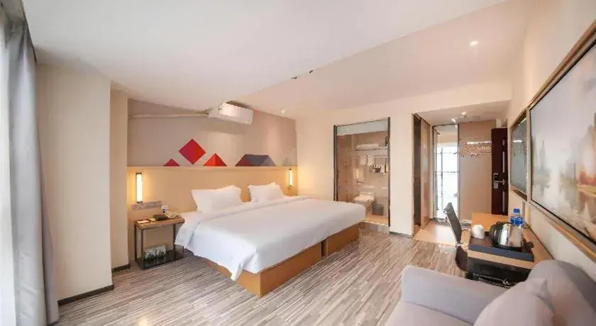 Bed in Borrman Hotel Guilin High-speed Railway North Station Evergrande Plaza Bed in Borrman Hotel Guilin High-speed Railway North Station Evergrande Plaza