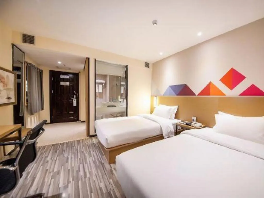 Bed in Borrman Hotel Guilin High-speed Railway North Station Evergrande Plaza