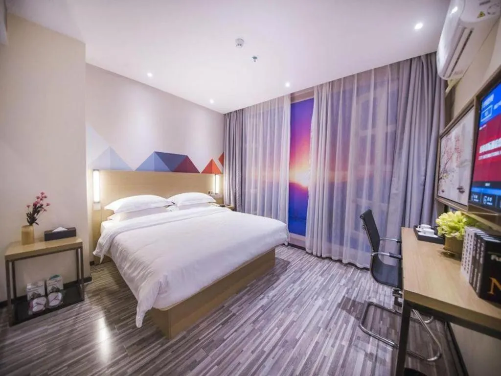 Bed in Borrman Hotel Guilin High-speed Railway North Station Evergrande Plaza