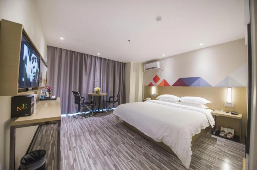 Bed in Borrman Hotel Guilin High-speed Railway North Station Evergrande Plaza