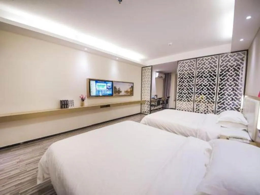 Bed in Borrman Hotel Guilin High-speed Railway North Station Evergrande Plaza