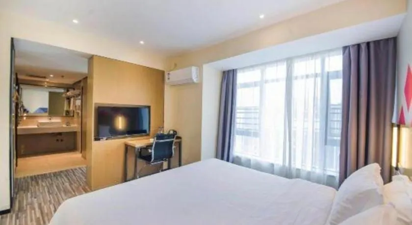 Bed in Borrman Hotel Guilin High-speed Railway North Station Evergrande Plaza