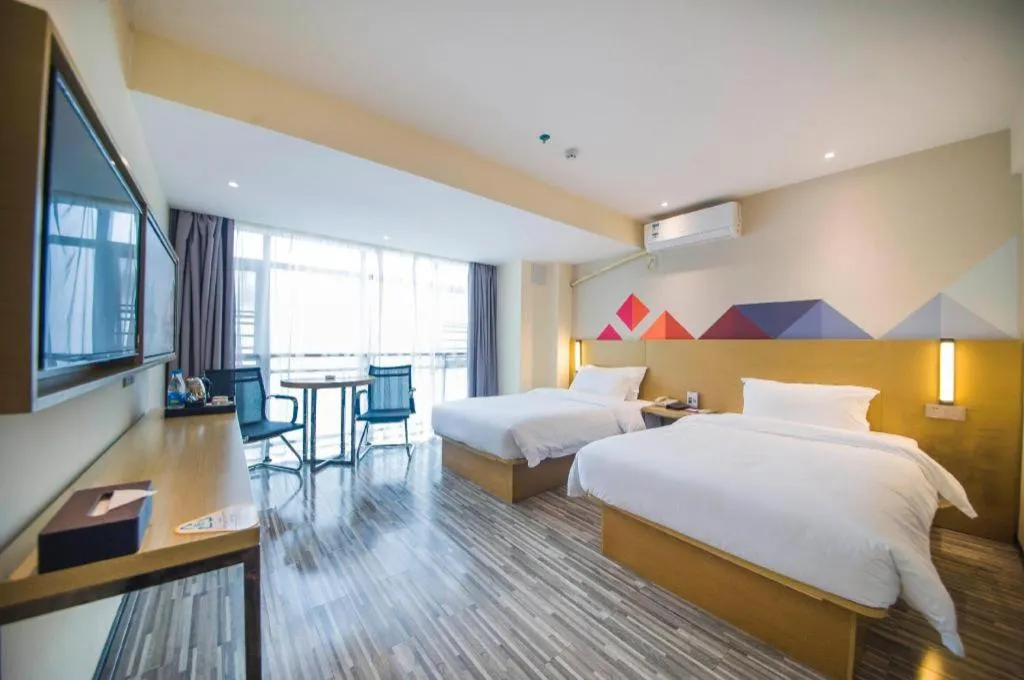 Bed in Borrman Hotel Guilin High-speed Railway North Station Evergrande Plaza