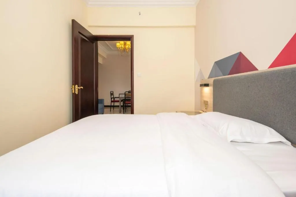 Bed in Borrman Hotel Guilin High-speed Railway North Station Evergrande Plaza