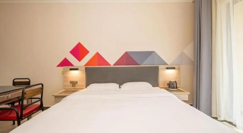 Bed in Borrman Hotel Guilin High-speed Railway North Station Evergrande Plaza