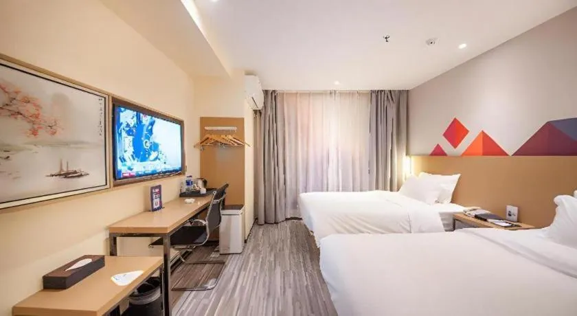 Bed in Borrman Hotel Guilin High-speed Railway North Station Evergrande Plaza